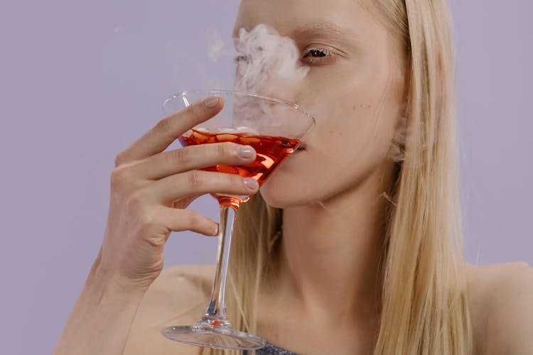 A Woman Drinking Cocktail