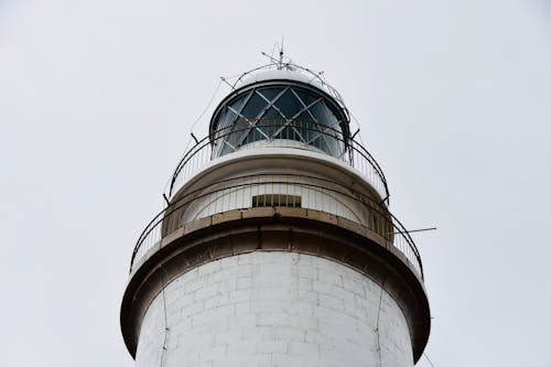 A Lighthouse Under White Sky