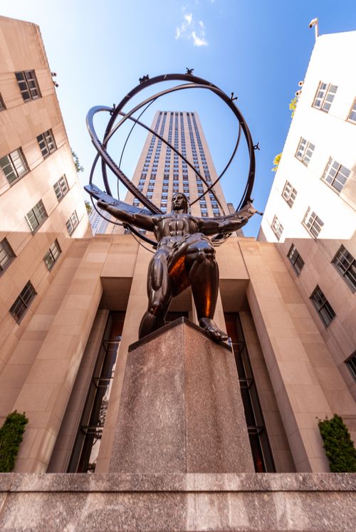 Free Iconic Atlas statue with skyscraper view at Rockefeller Center in New York City. Stock Photo