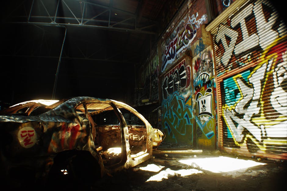 Free stock photo of #car #graffiti #abandoned #warehouse #abandonedcar