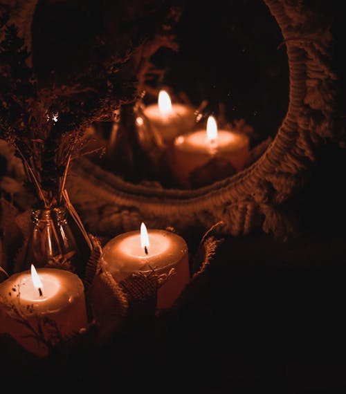 Free Lighted Candles in Front of a Mirror Stock Photo