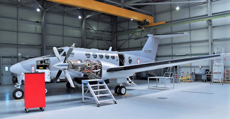 Gray Airplane In The Hangar