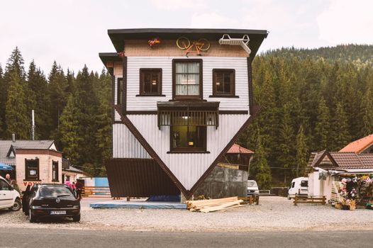White and Brown Wooden House Near Green Trees