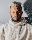 Portrait of Man Behind Glass