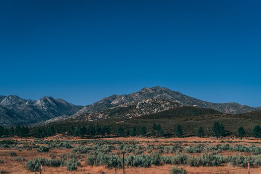 Scenic view of the San Bernardino mountain range under a clear blue sky in California.