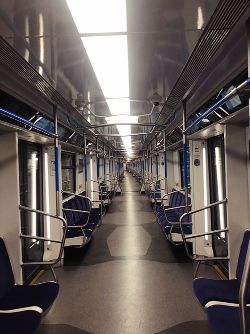 Free Empty Moscow metro train showcasing modern design and seating arrangements. Stock Photo