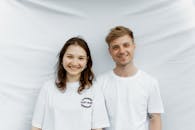 A Couple Wearing White Shirts