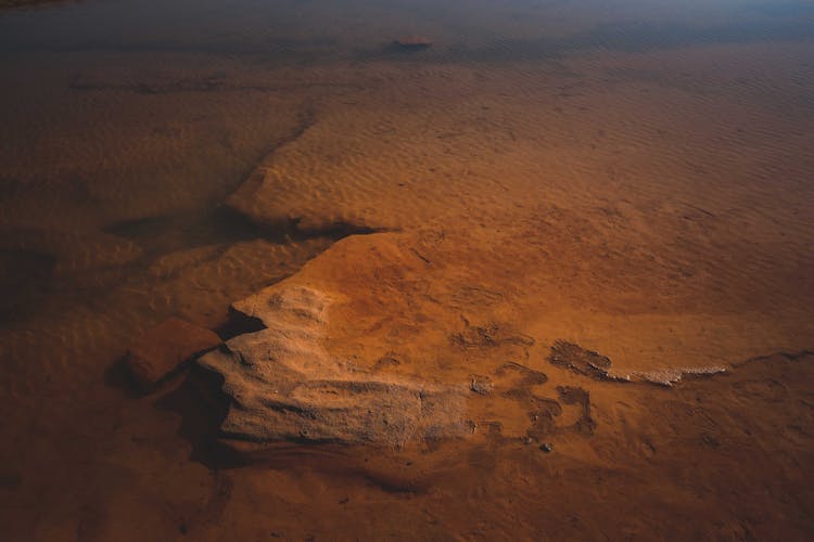 Sandy Sea Floor With Stones And Formations