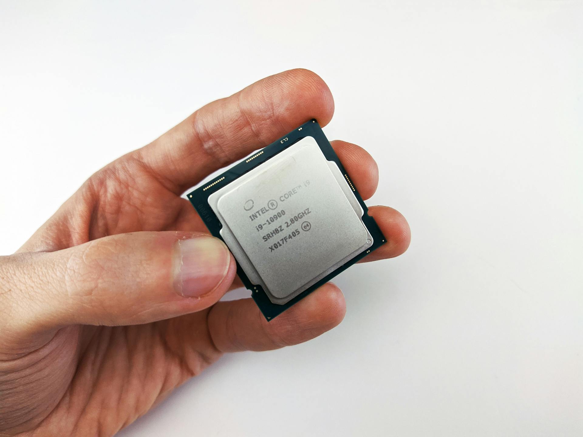 Person Holding an Intel Processor