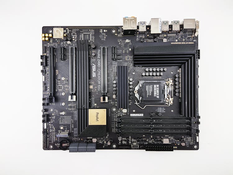 Cut Out Of A Computer Motherboard On White Background
