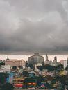 City Skyline Under Gray Cloudy Sky