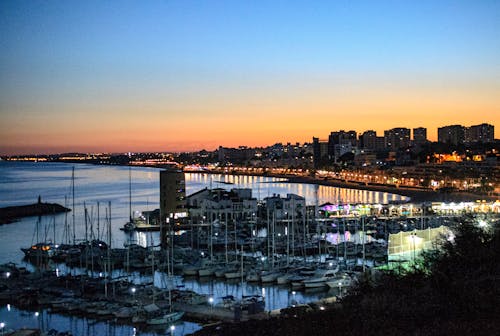 Boats on the Harbor at Sundown