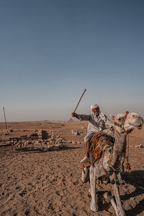 Man Riding a Camel