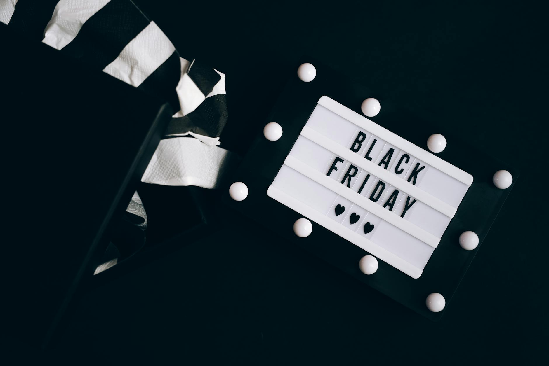 https://www.pexels.com/photo/black-friday-sign-5556282/