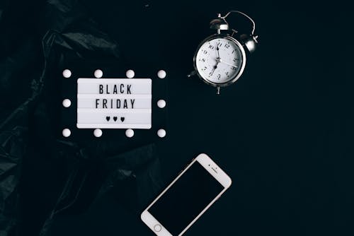 Free Black Friday Sign, Clock and Smartphone Stock Photo