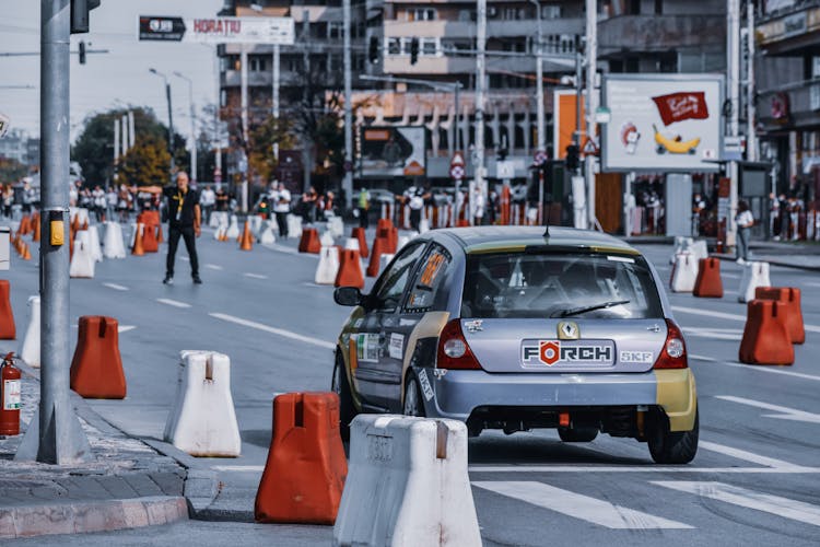 Shiny Silver Car Driving In Racing Competition