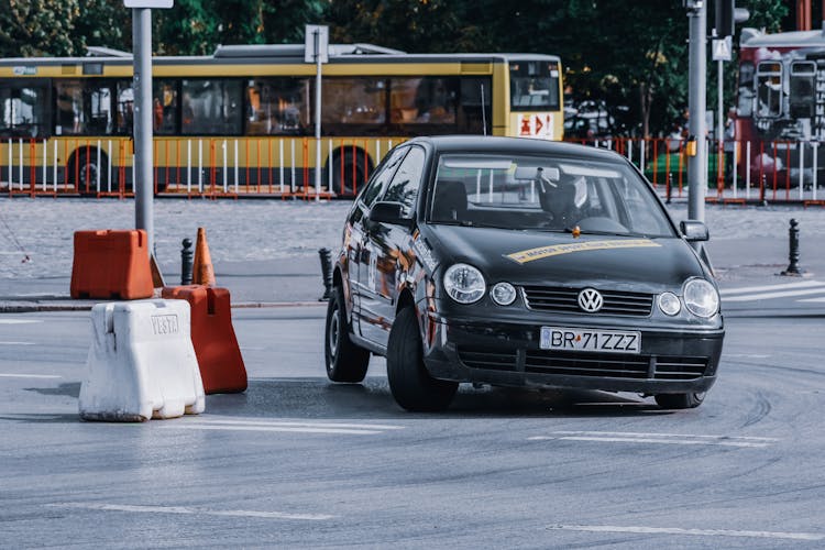 Unrecognizable Driver On Race Track