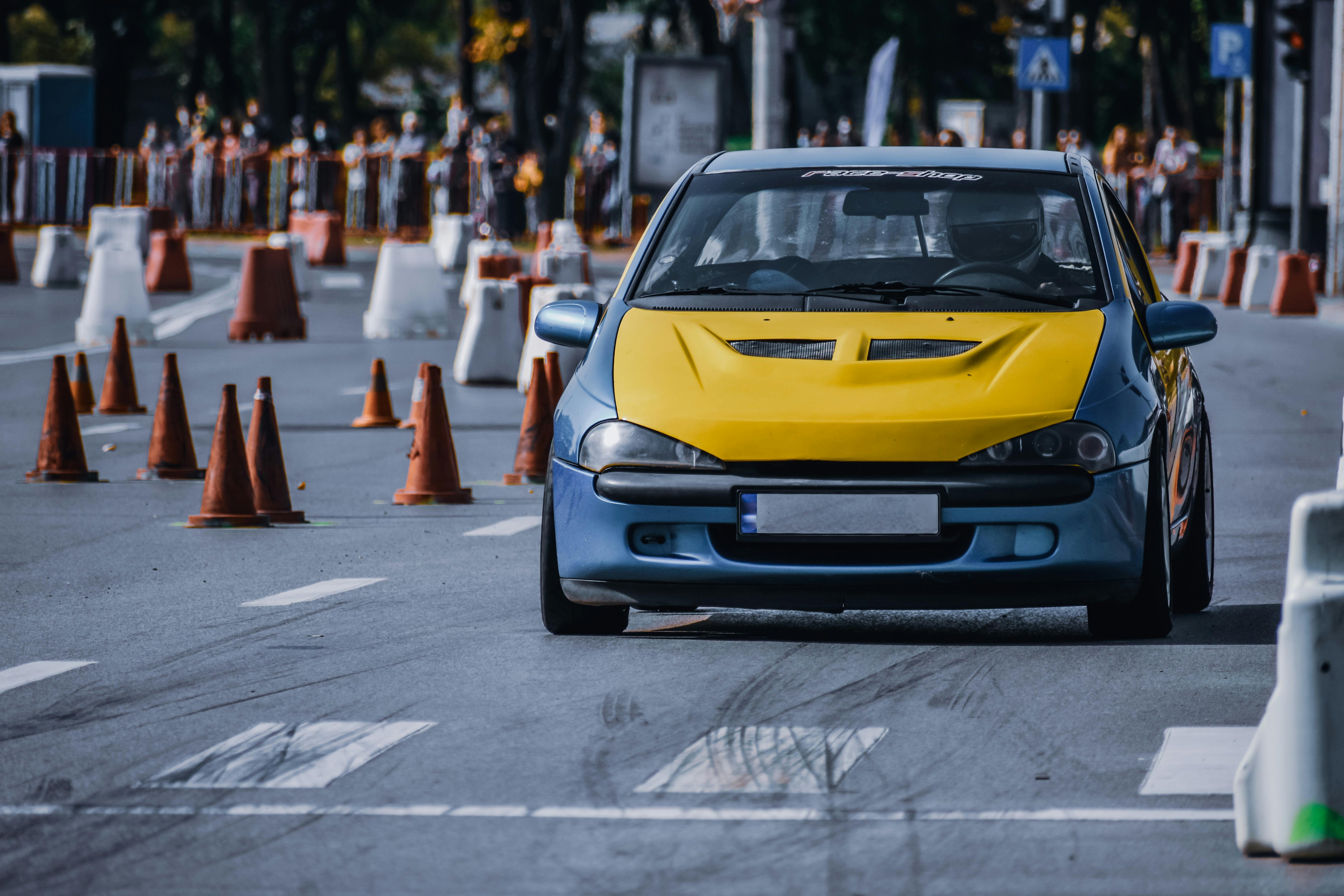 modern sport car racing on asphalt street in city