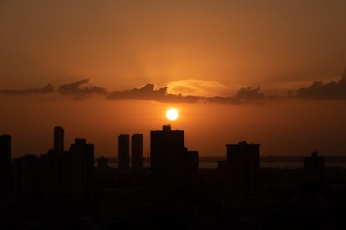 Silhouette of City Buildings during Sunset