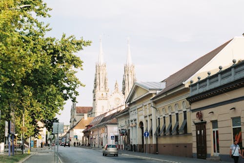 Houses, Pedestrians and Cathedral in City