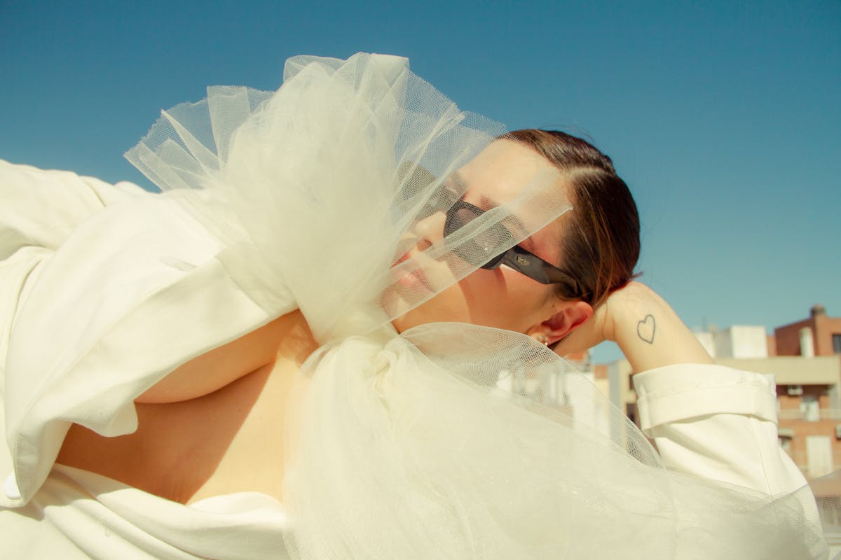 Couple sitting with a therapist, talking together in a counseling session