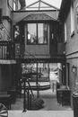 Black and White Photo of an Architecture with a Passage 