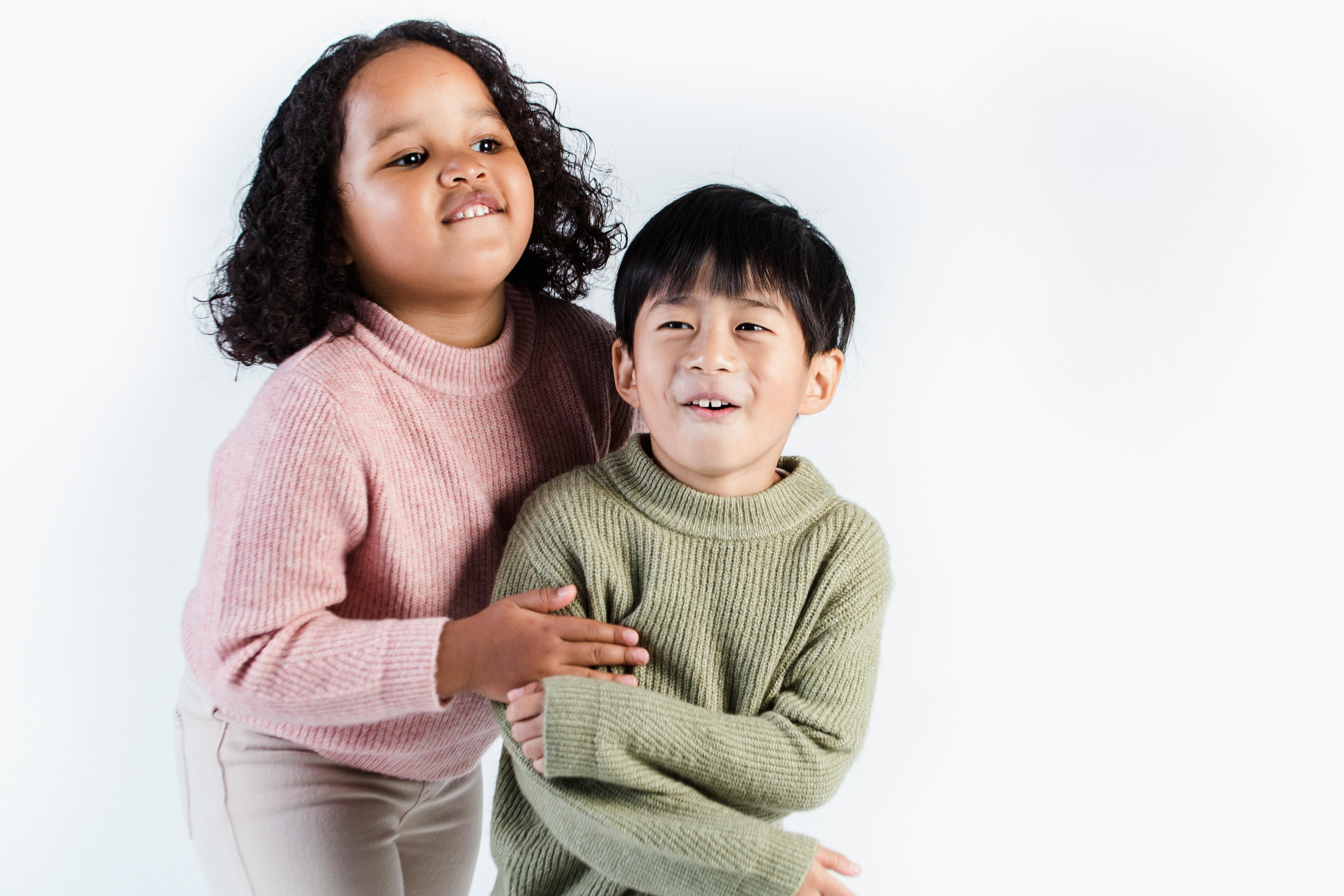 adorable diverse kids having fun in studio