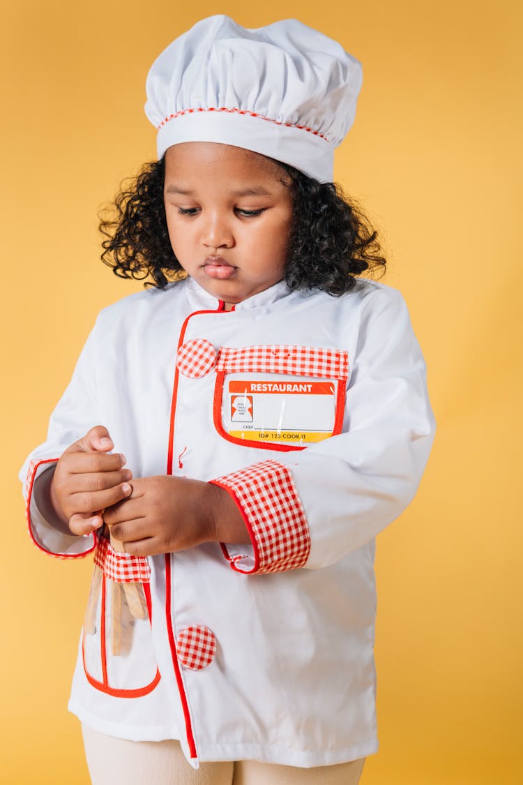 Little Black Girl In Chef Jacket