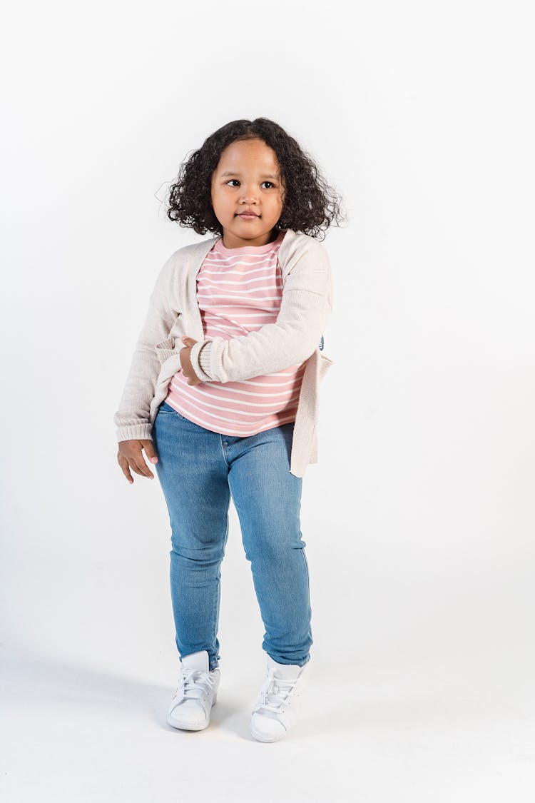 Cute Black Girl In Casual Outfit In Studio