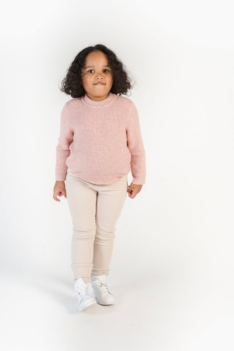 Charming Hispanic Girl In Trendy Wear On White Background