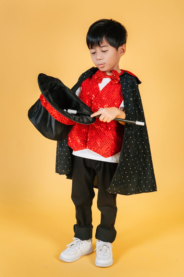 Little Boy In Magician Costume