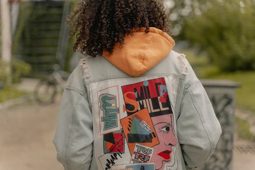Graphic on Back of Denim Jacket on Woman