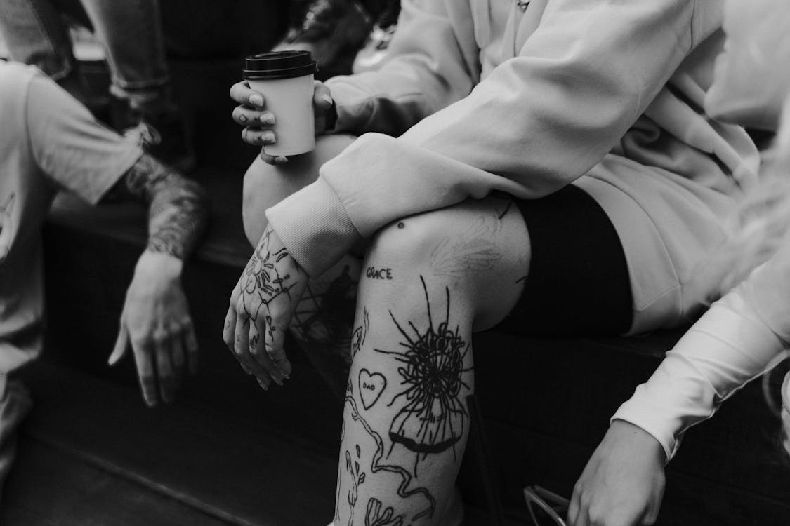 cupped hands tattoo