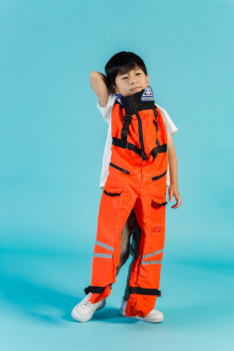 Content Asian Boy With Spacesuit