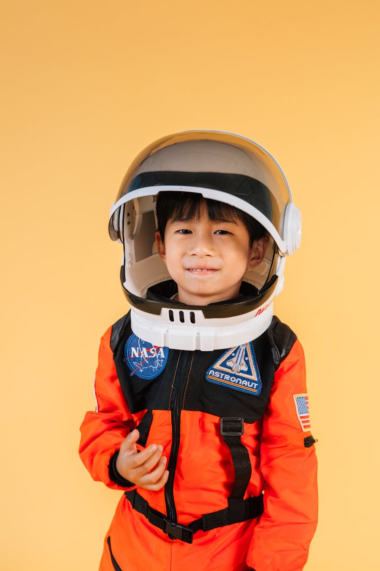 Content Asian Boy Wearing Spacesuit