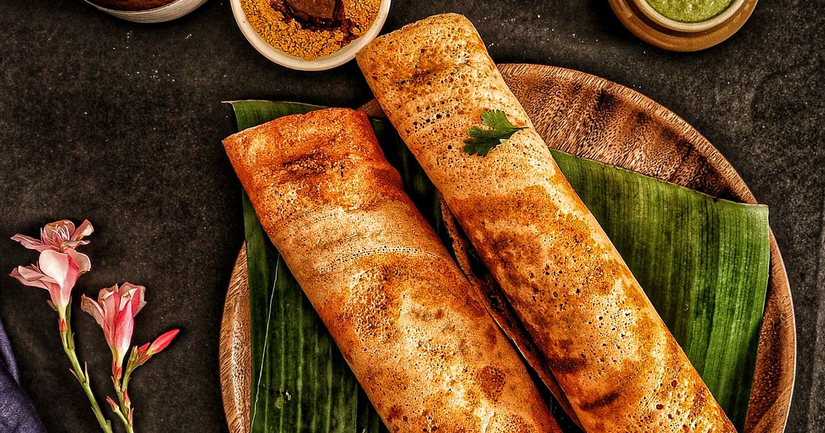Dosa with chutneys and sambar on banana leaves (Shradh/Annual Ceremony Catering in Vellore)