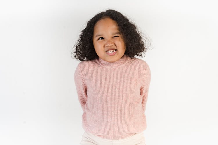 Cool Black Girl Grimacing In Studio