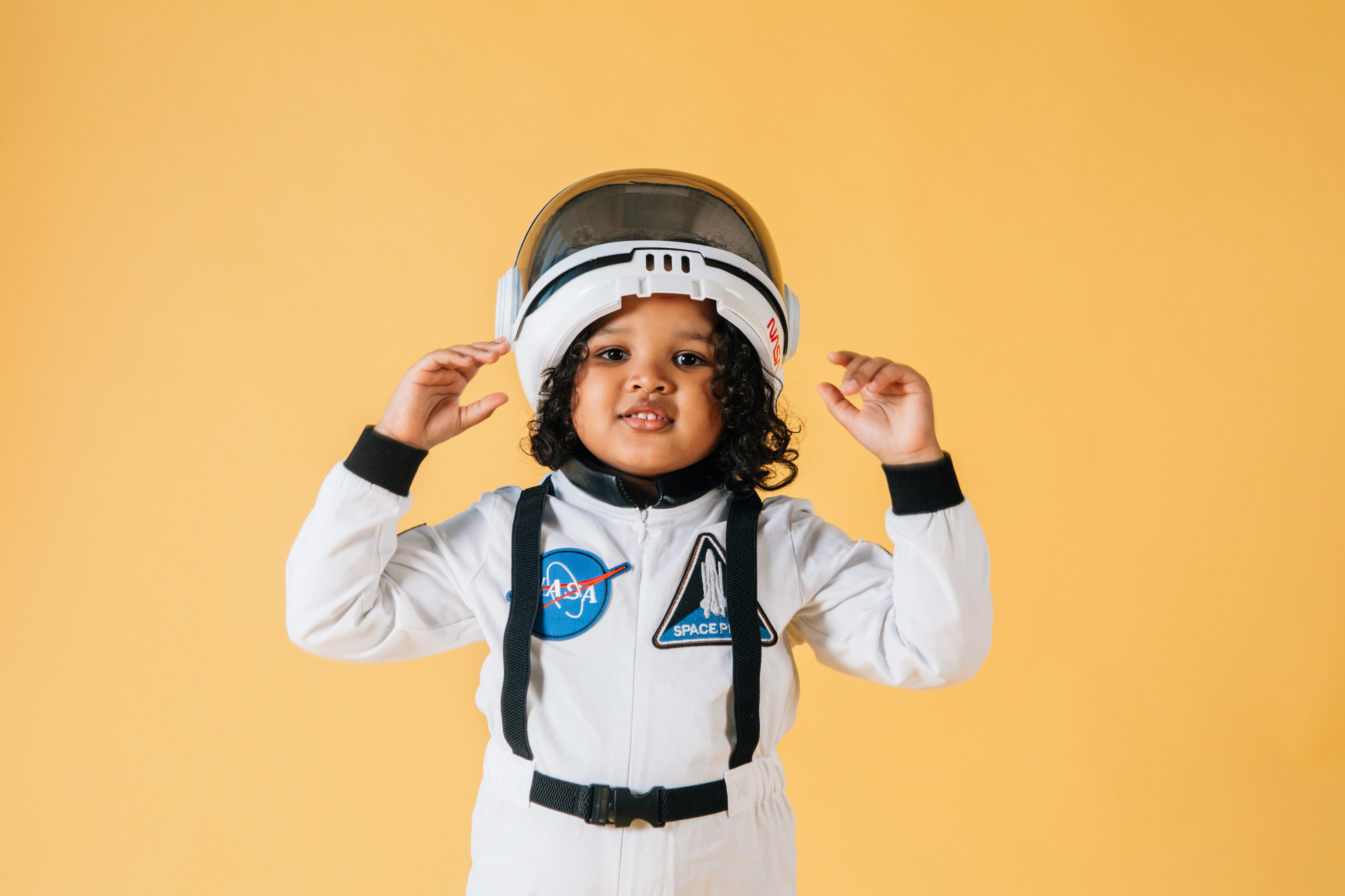 funny black girl wearing spaceman costume