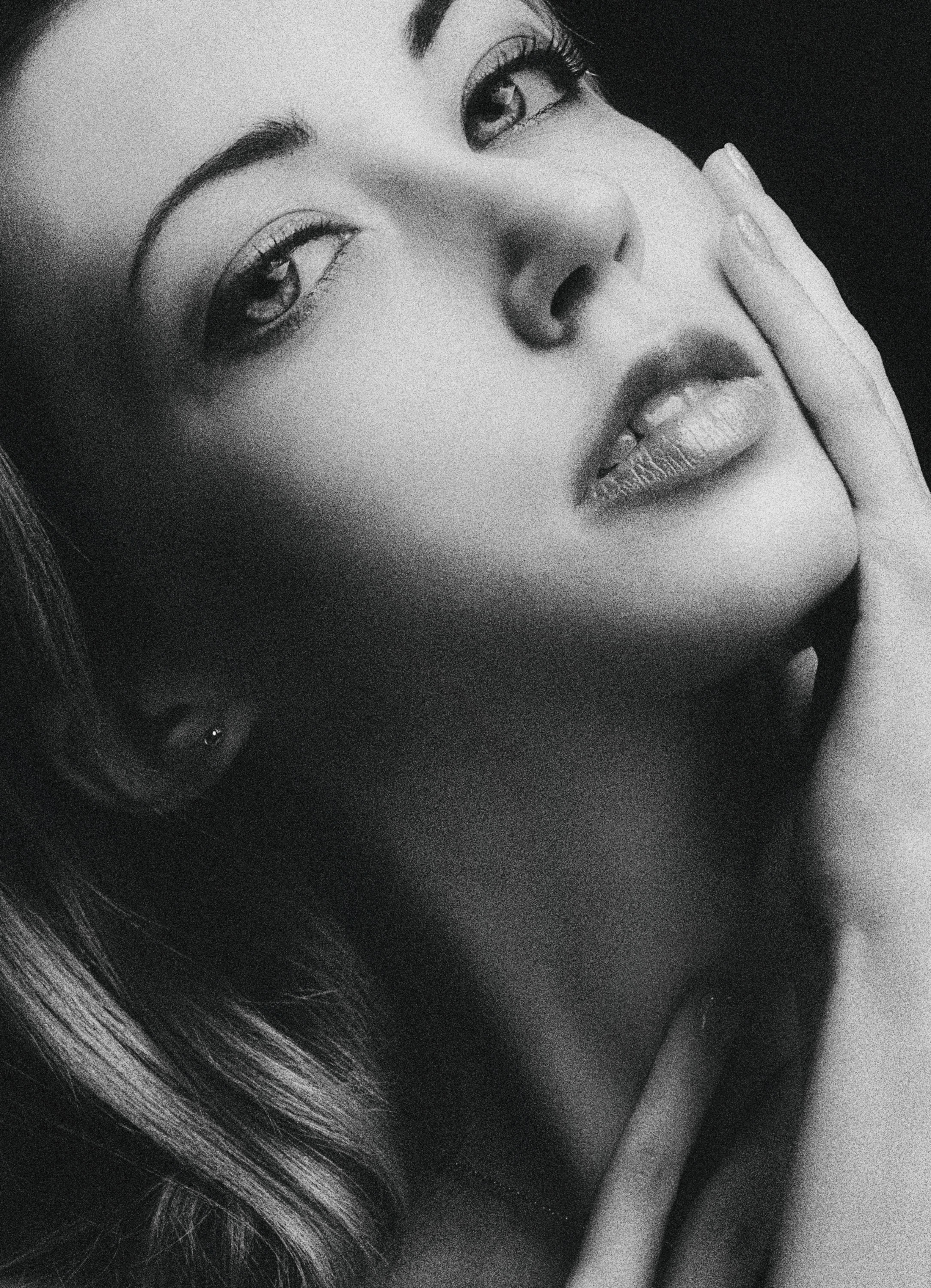 Black and White Close-up Portrait of a Young Woman · Free Stock Photo