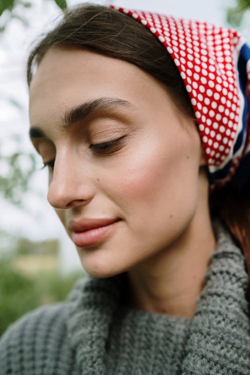 A Woman with Polka Dots Headscarf