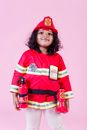 Funny black girl in firefighter uniform