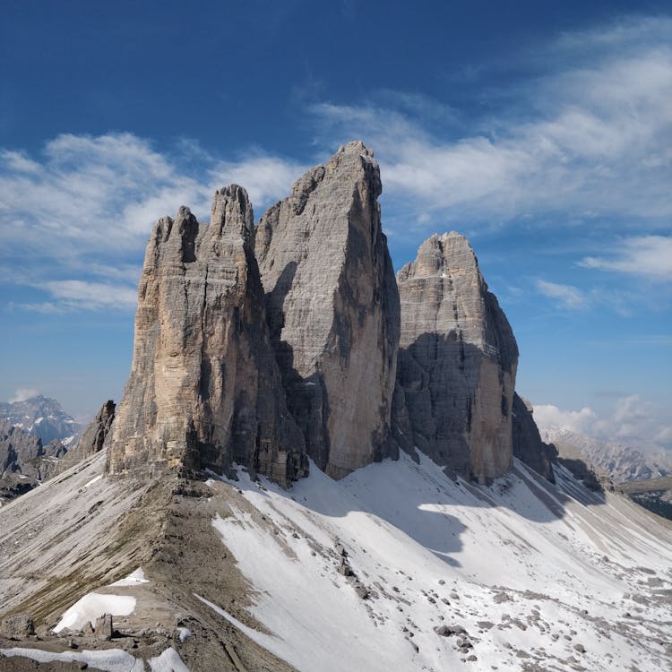 Tre Cime Di Lavaredo Peaks Under Blue Sky