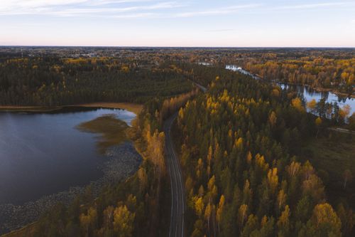 Free Drone capture of a scenic autumn landscape with lakes and forests in Leningradskaya oblast, Russia. Stock Photo