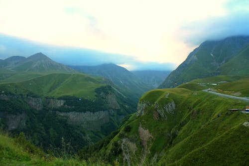 Green Mountains Under White Clouds