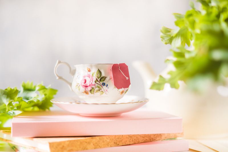 small travel tin of tea bags inside a tote bag