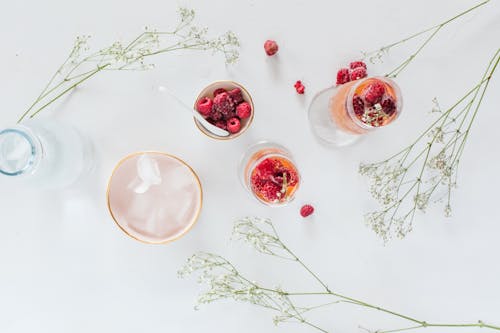 Free Red and Green Plant on White Table Stock Photo