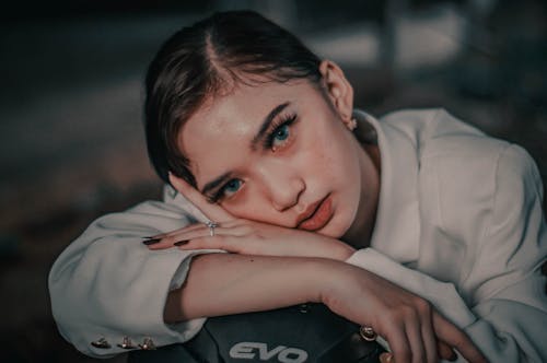 Young sensual woman on motorcycle