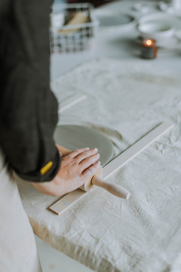 Craftsman Shaping A Clay