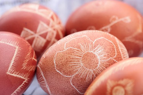 Close-up Shot of Brown Egg with Drawing