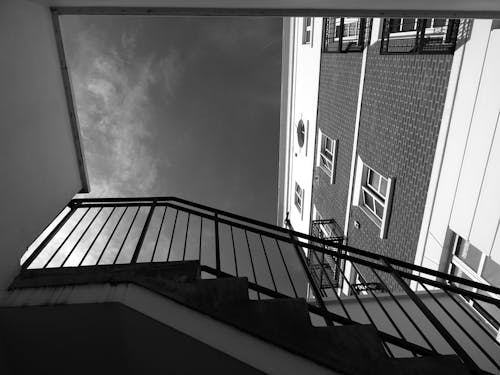 Grayscale Photography of Stairs and Building